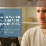 how-to-watch-old-vhs-tapes-in-2026 – Your Photo Assistant Confused man holding a VHS tape while trying to figure out how to play it in 2026